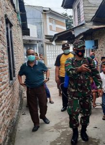 Satgas TMMD 109 Kodim 0208/AS Melakukan Penyemprotan Disinfektan