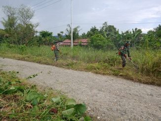 Satgas TNI dan Aparat Desa serta Masyarakat Laksanakan Kerja Bakti